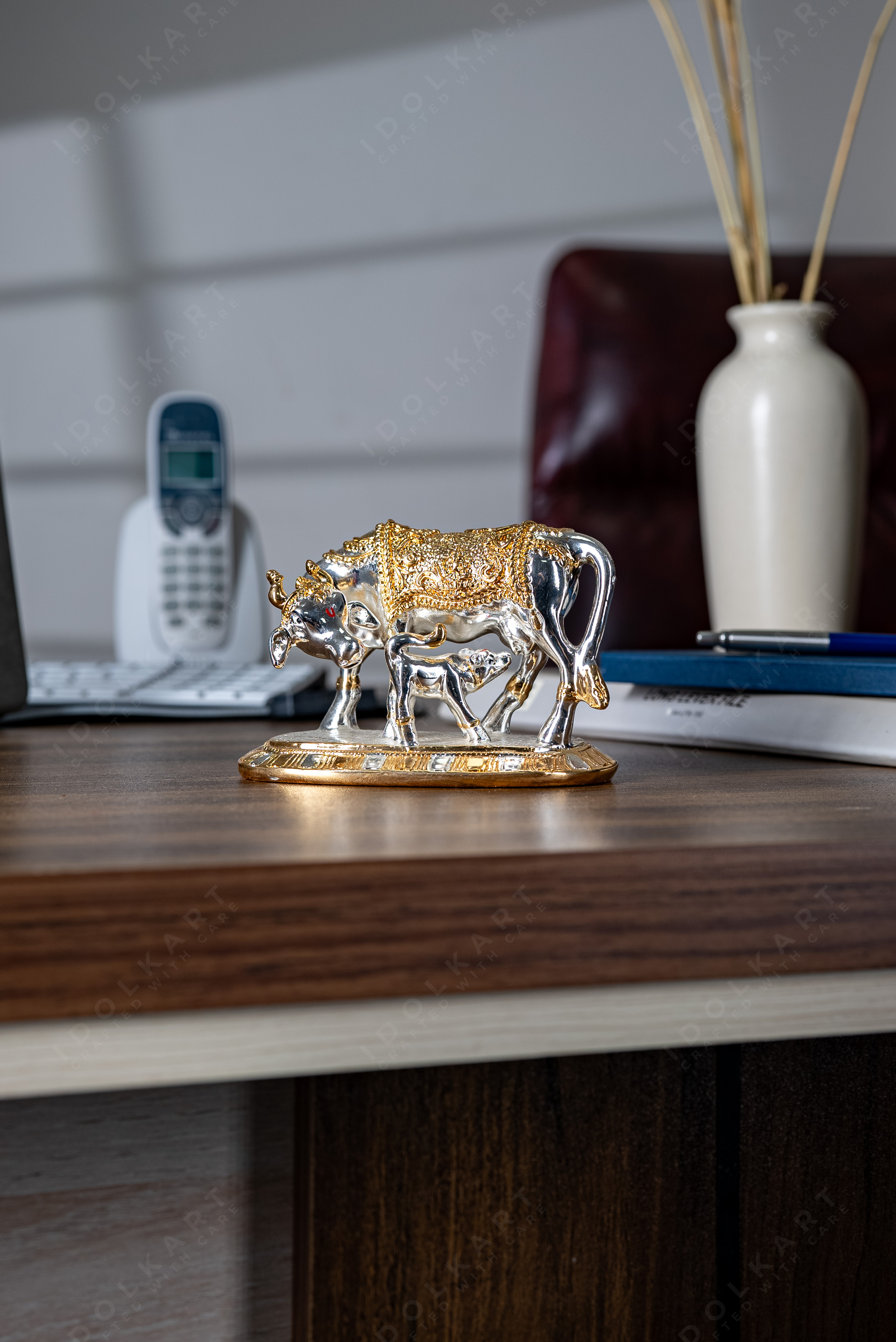 Kamadhenu Idol on table
