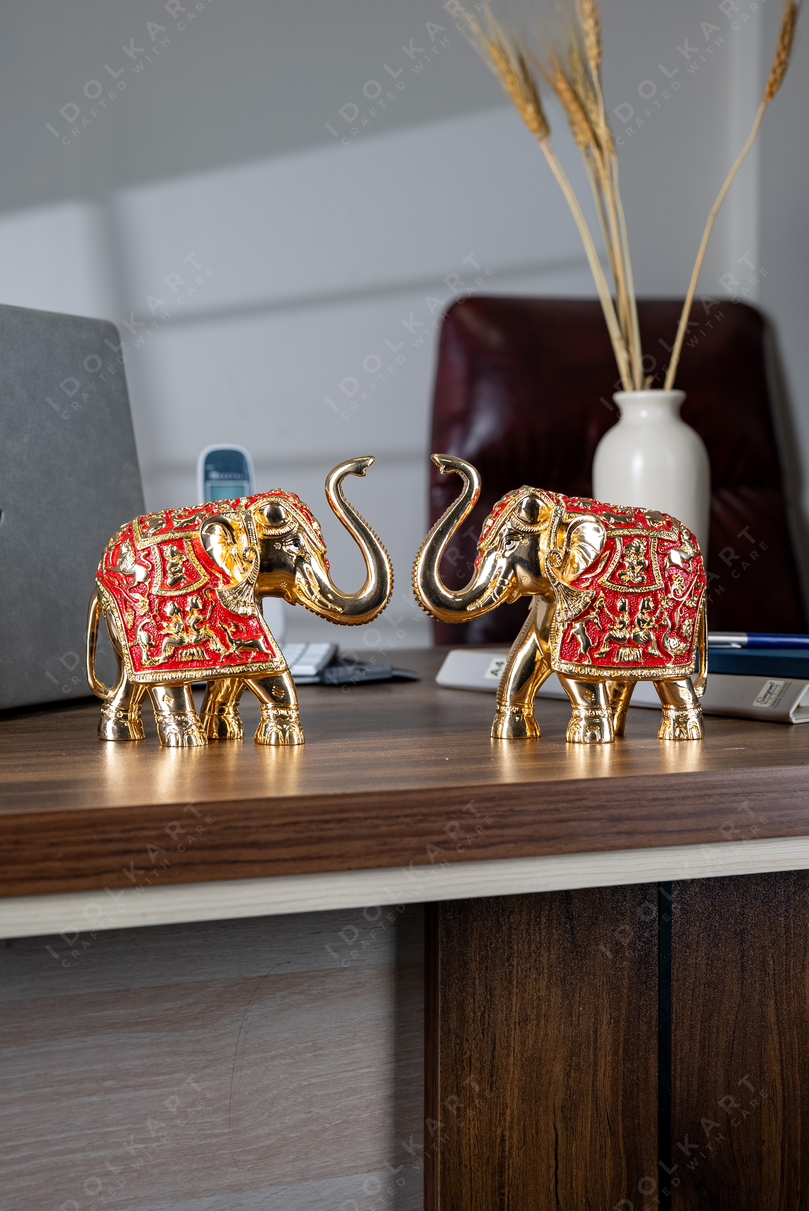 Gold-Red elephant Pair on table