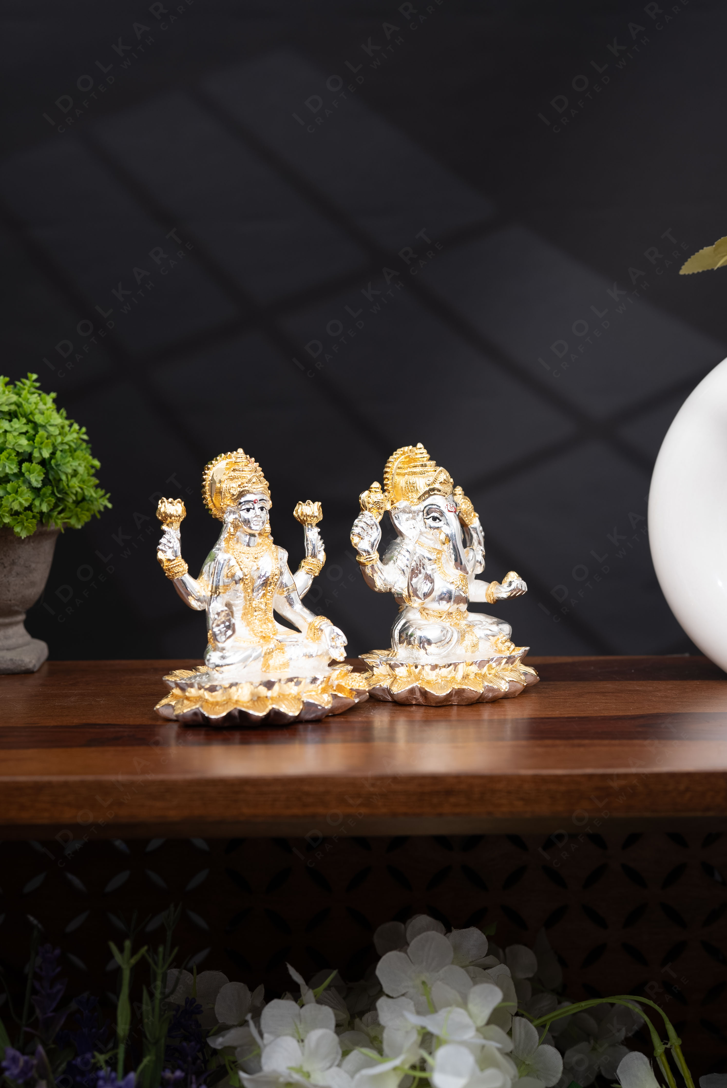 Gold Ganesha and Lakshmi Idol on Lotus