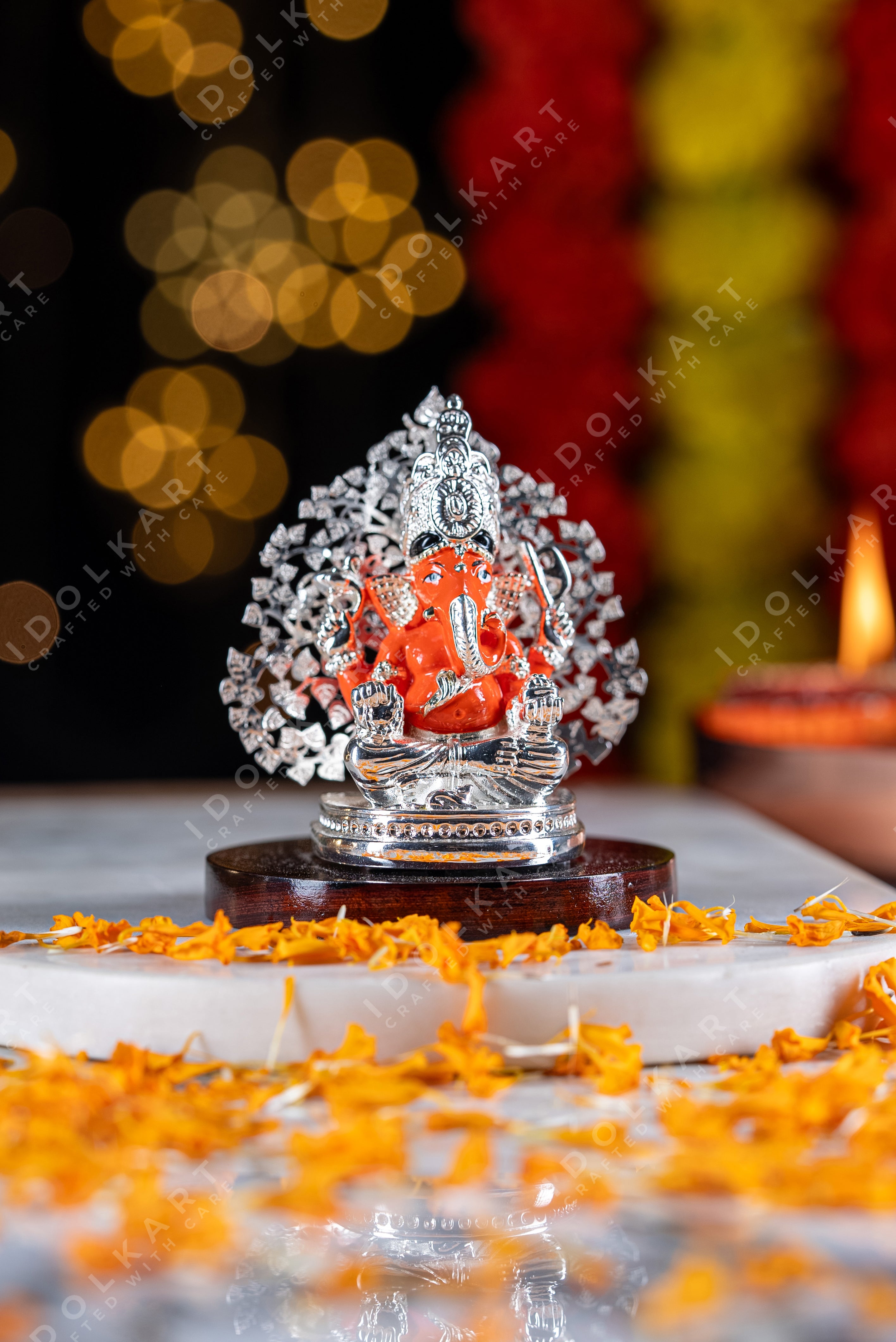 Silver Coated Tree Ganesha Idol